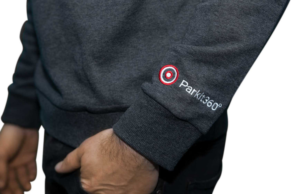 Close up of Parkit360 logo embroidery on Sweater